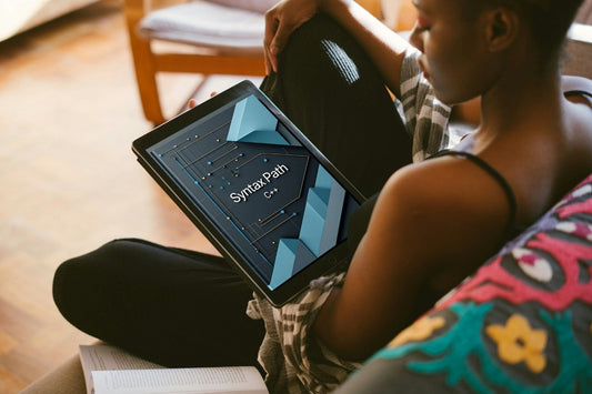 Person holding a device with 'Syntax Path' course in a casual setting